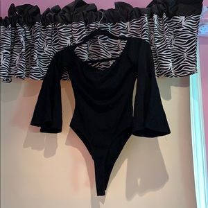 black long sleeve body suit with bell sleeves